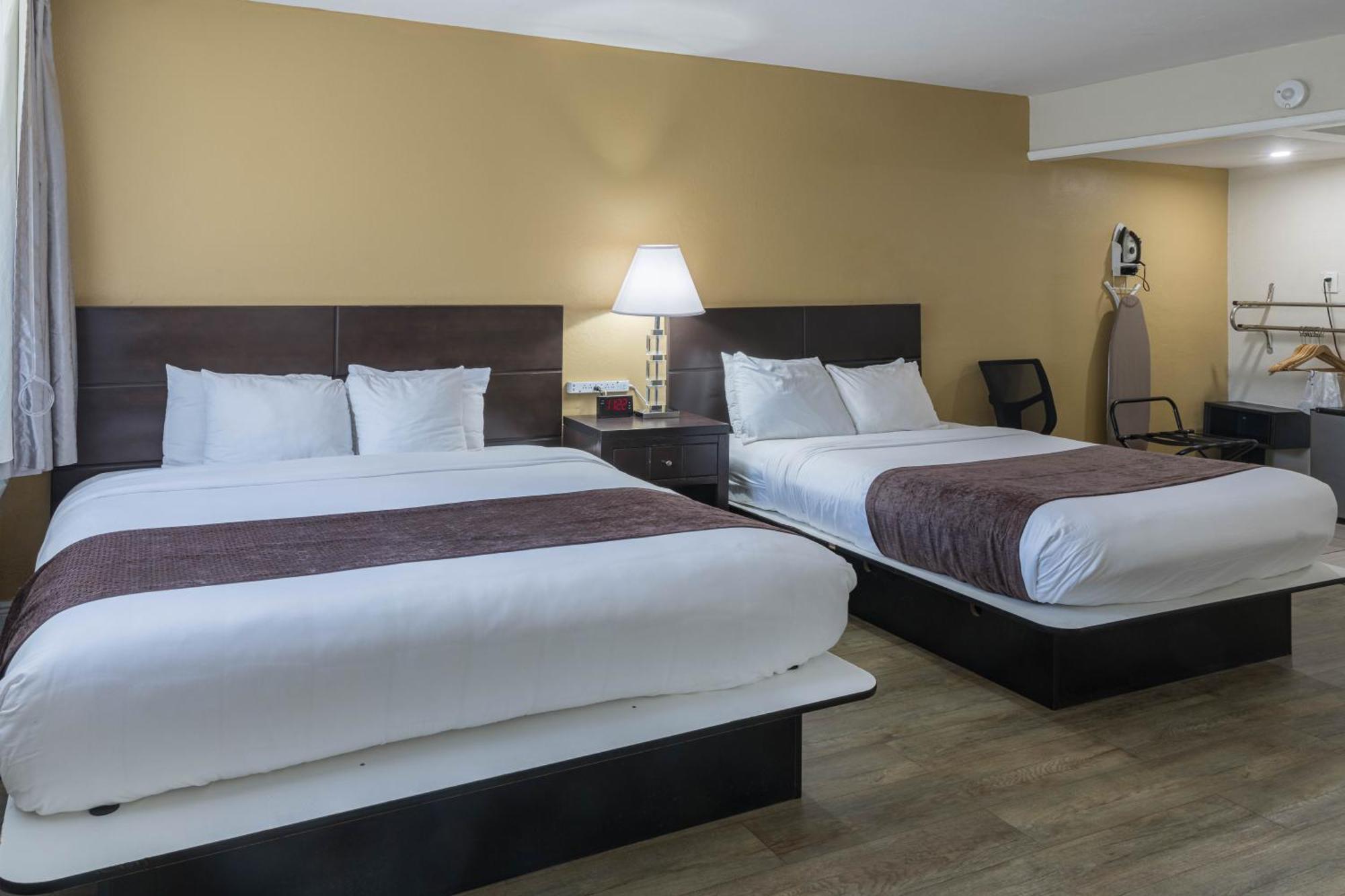 One King Bed & One Queen Bed